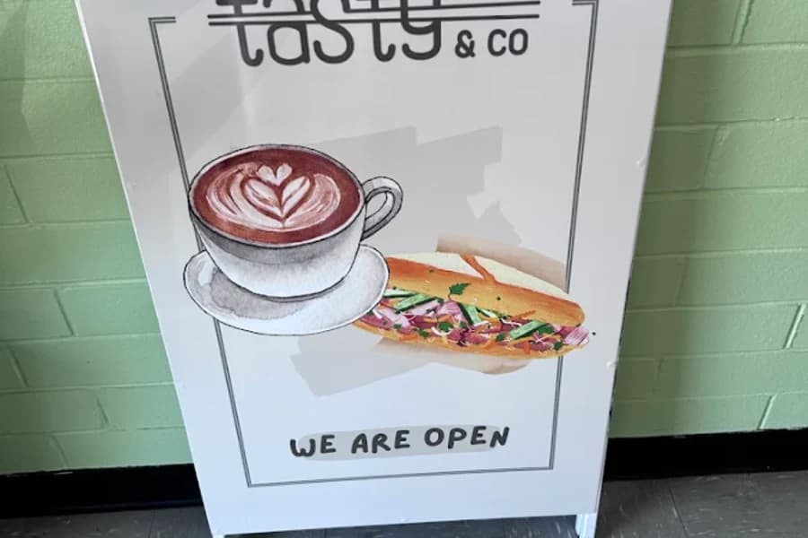 Tasty & Co welcome sign and entrance path