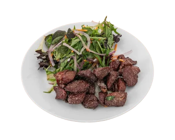 BBQ Beef Salad with mixed greens, red onion, and house dressing